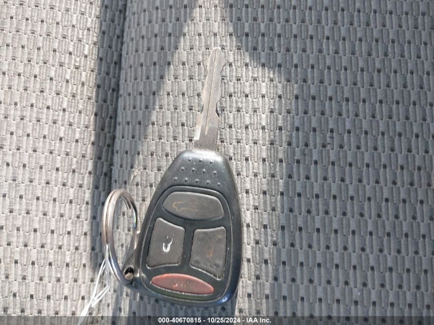 2007 Jeep Commander Sport VIN: 1J8HG48K27C556937 Lot: 40670815