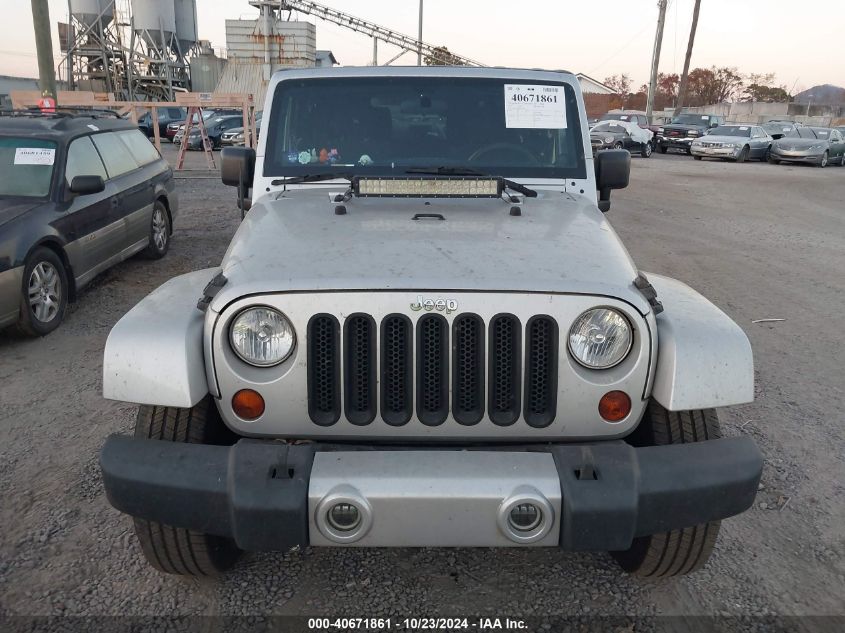 2011 Jeep Wrangler Sahara VIN: 1J4AA5D16BL539140 Lot: 40671861