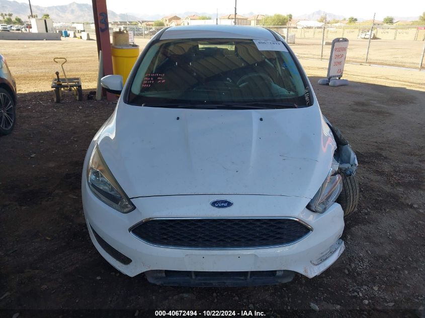 2015 Ford Focus Se VIN: 1FADP3K23FL307253 Lot: 40672494