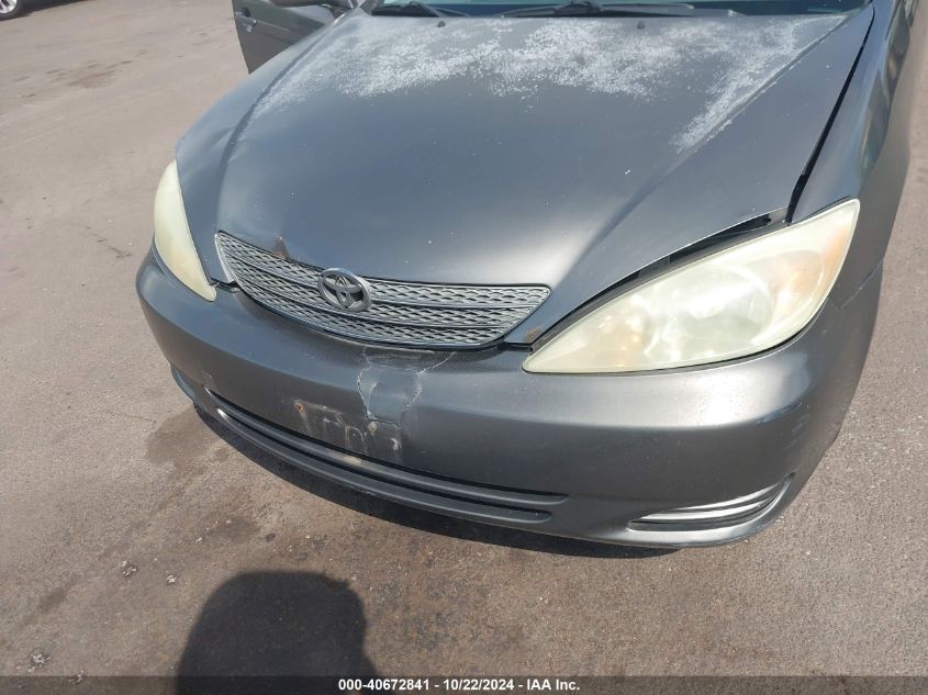 2004 Toyota Camry Le/Se/Std/Xle VIN: JTDBE32K040296749 Lot: 40672841