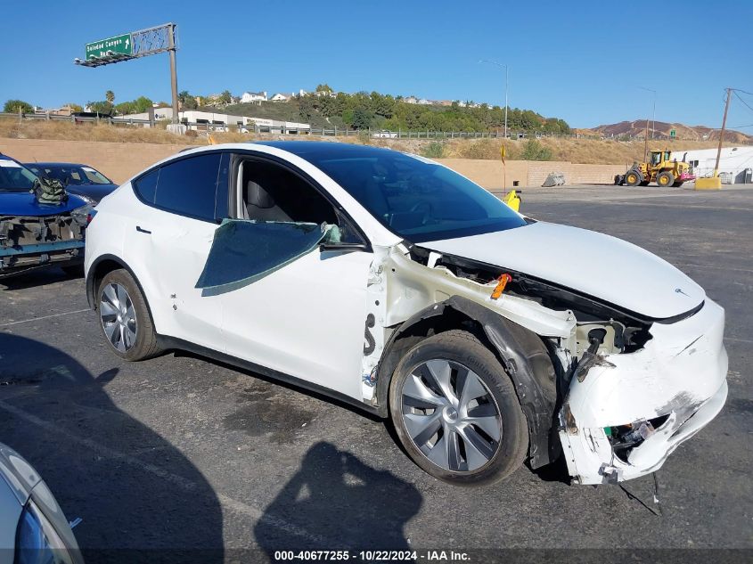 2023 Tesla Model Y Awd/Long Range Dual Motor All-Wheel Drive VIN: 7SAYGDEE0PA152351 Lot: 40677255