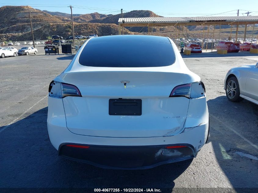 2023 Tesla Model Y Awd/Long Range Dual Motor All-Wheel Drive VIN: 7SAYGDEE0PA152351 Lot: 40677255