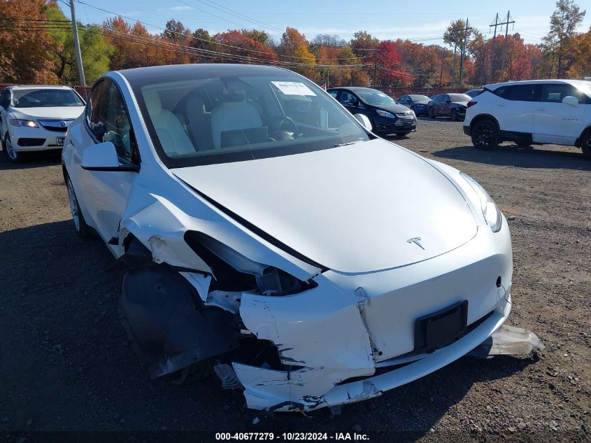 2022 Tesla Model Y Long Range Dual Motor All-Wheel Drive VIN: 7SAYGDEE9NF310377 Lot: 40677279