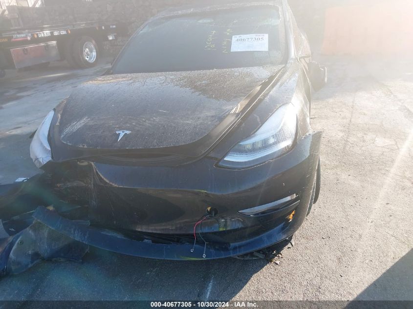 2021 Tesla Model 3 Long Range Dual Motor All-Wheel Drive VIN: 5YJ3E1EB0MF858428 Lot: 40677305