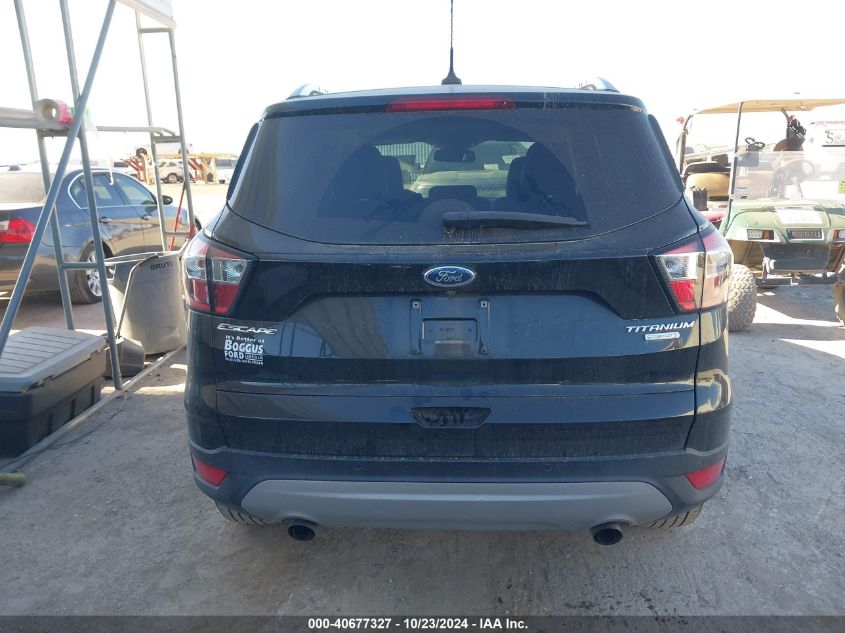 2018 Ford Escape Titanium VIN: 1FMCU0J91JUD58261 Lot: 40677327