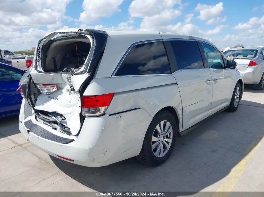 VIN 5FNRL5H63EB088670 2014 HONDA ODYSSEY no.4