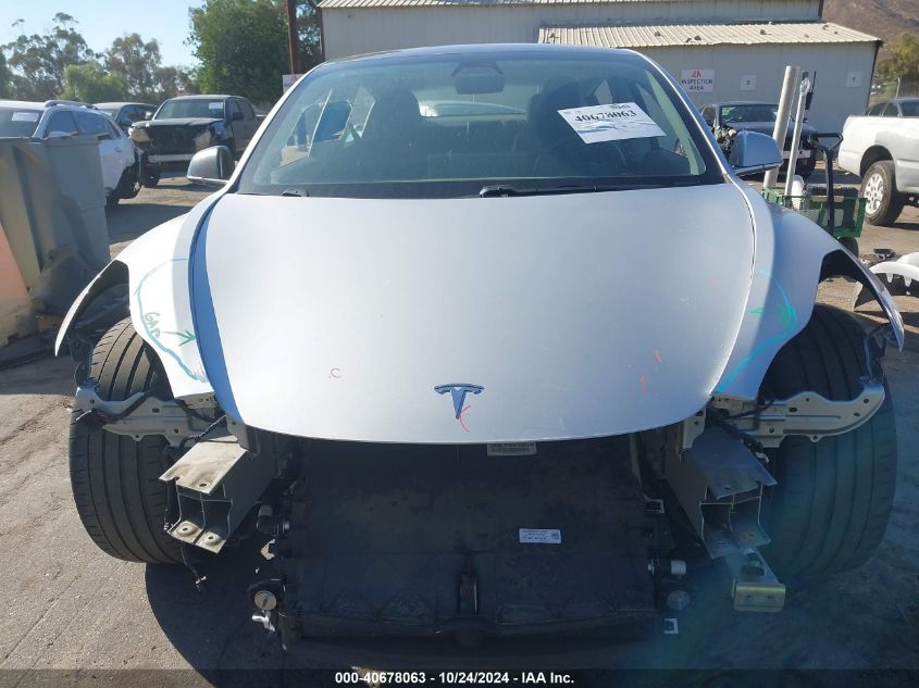 2018 Tesla Model 3 Long Range/Mid Range VIN: 5YJ3E1EA3JF043773 Lot: 40678063