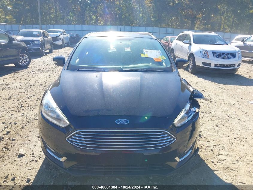 2017 Ford Focus Titanium VIN: 1FADP3N25HL272679 Lot: 40681304