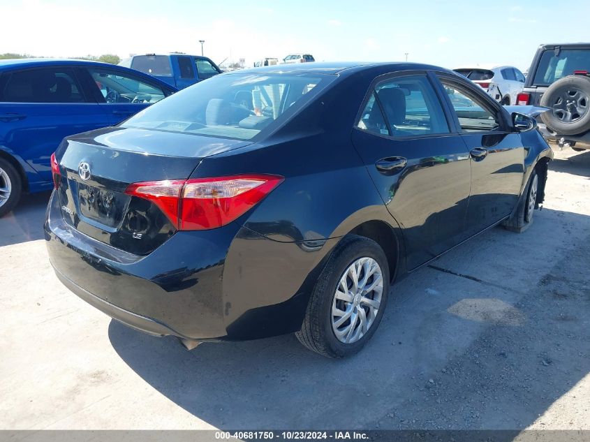 VIN 5YFBURHE9KP941117 2019 Toyota Corolla, LE no.4