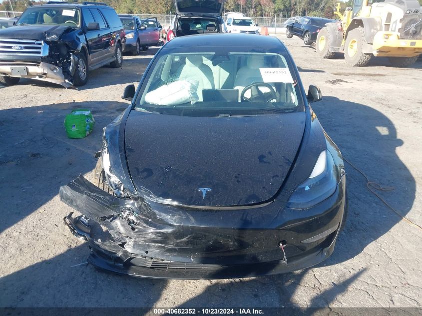 2021 Tesla Model 3 Long Range Dual Motor All-Wheel Drive VIN: 5YJ3E1EB4MF015588 Lot: 40682352