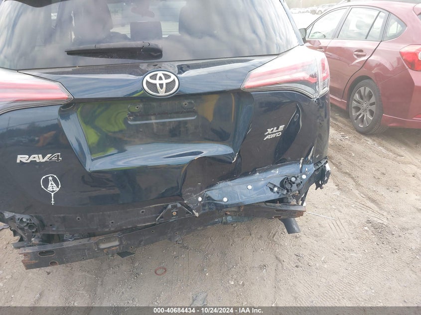 2018 TOYOTA RAV4 ADVENTURE/XLE VIN: JTMRFREV9JJ727423