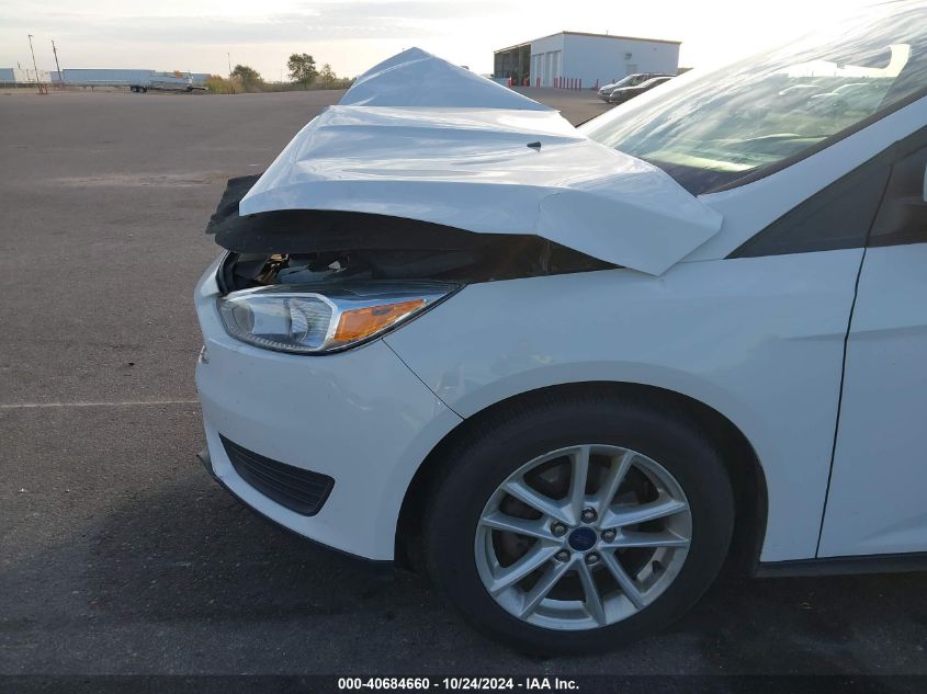 2015 Ford Focus Se VIN: 1FADP3K24FL329486 Lot: 40684660