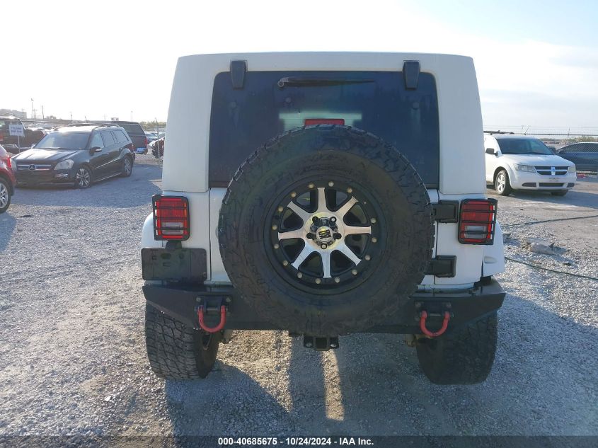 2010 Jeep Wrangler Unlimited Sahara VIN: 1J4BA5H11AL182897 Lot: 40685675