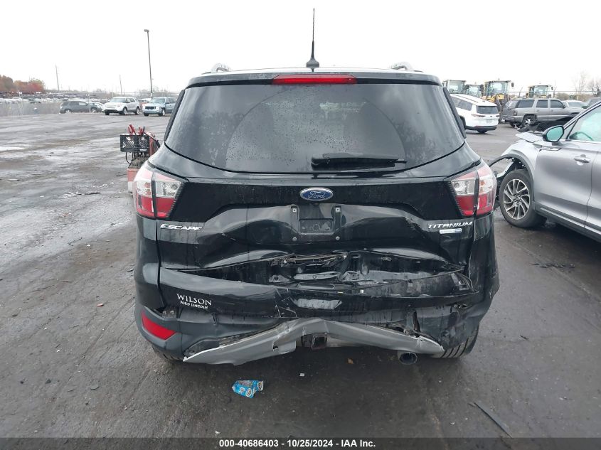 2018 Ford Escape Titanium VIN: 1FMCU9J98JUB71233 Lot: 40686403