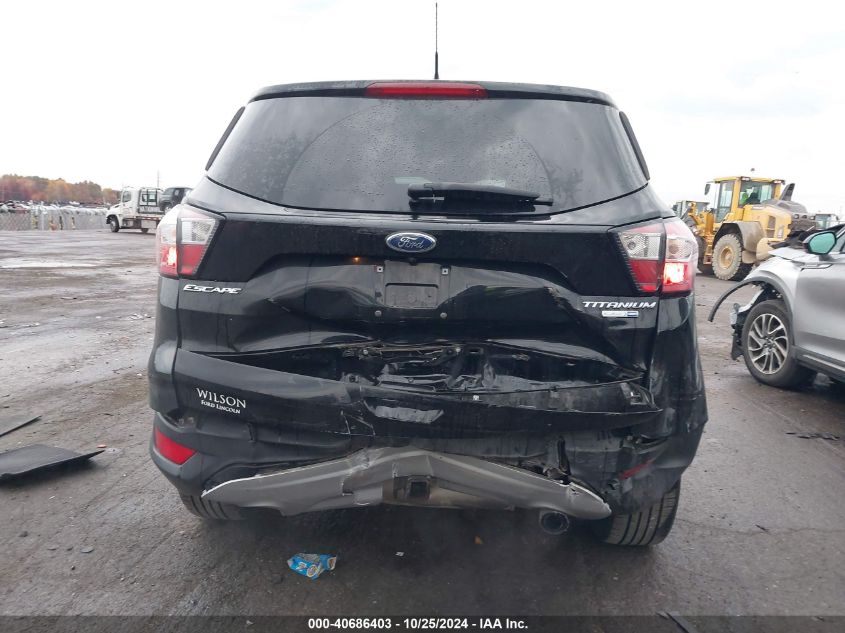 2018 Ford Escape Titanium VIN: 1FMCU9J98JUB71233 Lot: 40686403