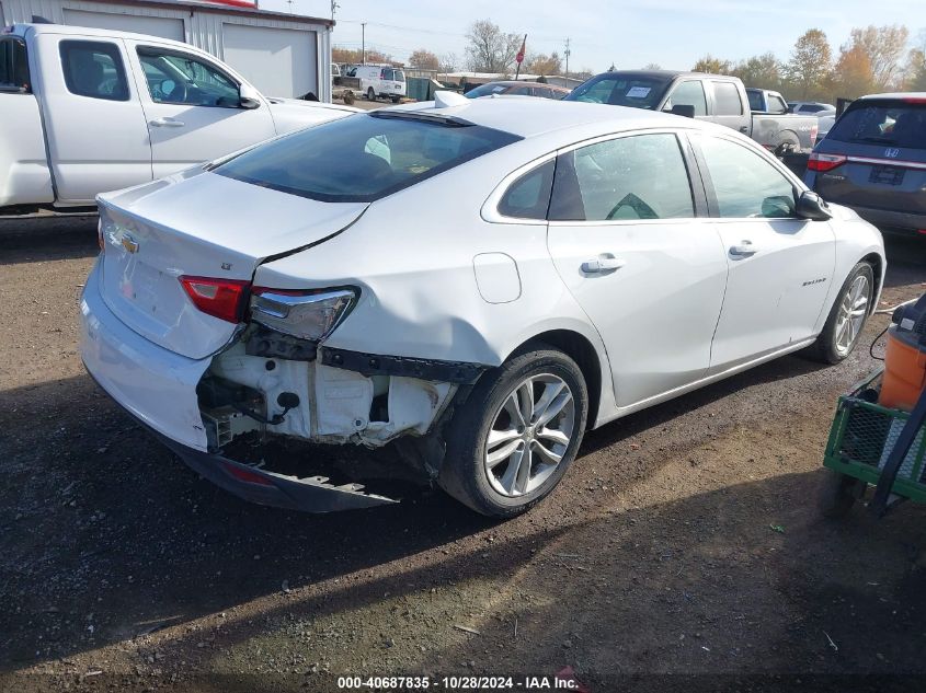 VIN 1G1ZD5ST3JF248685 2018 Chevrolet Malibu, LT no.4