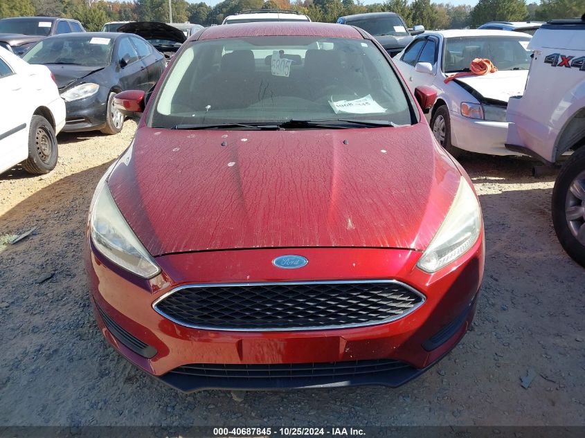 2015 Ford Focus Se VIN: 1FADP3F24FL214395 Lot: 40687845