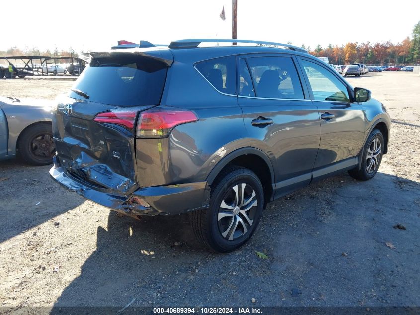 VIN JTMBFREV6HJ137515 2017 Toyota RAV4, LE no.4