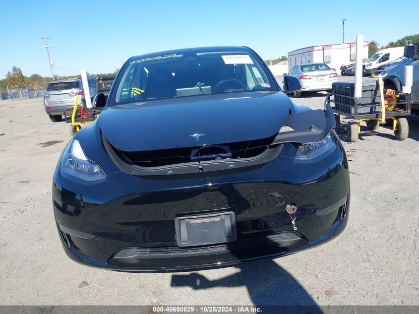 2023 Tesla Model Y Awd/Long Range Dual Motor All-Wheel Drive VIN: 7SAYGAEE2PF612921 Lot: 40690829