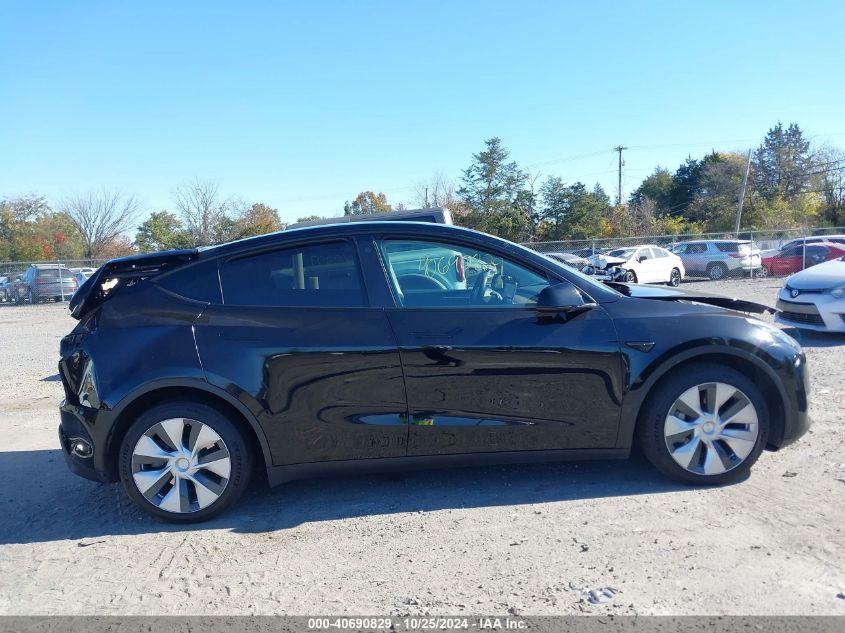 2023 Tesla Model Y Awd/Long Range Dual Motor All-Wheel Drive VIN: 7SAYGAEE2PF612921 Lot: 40690829