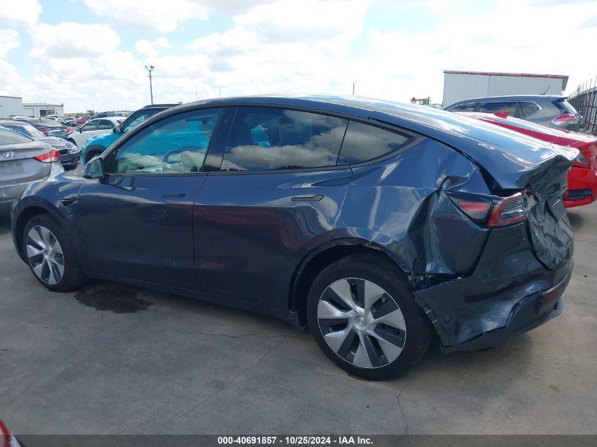 2023 Tesla Model Y Awd/Long Range Dual Motor All-Wheel Drive VIN: 7SAYGDEE8PF638893 Lot: 40691857