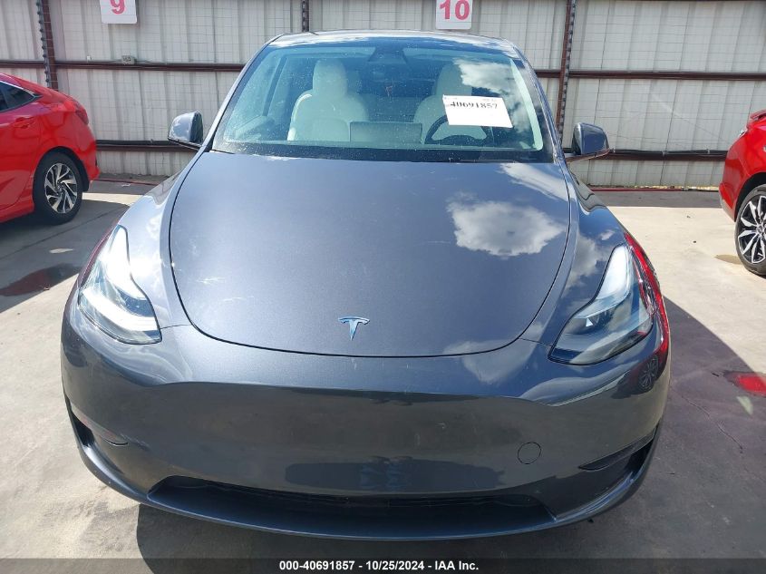 2023 Tesla Model Y Awd/Long Range Dual Motor All-Wheel Drive VIN: 7SAYGDEE8PF638893 Lot: 40691857