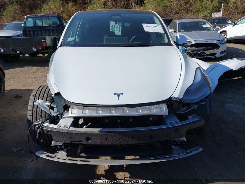 2024 Tesla Model Y Long Range Dual Motor All-Wheel Drive VIN: 7SAYGDEE4RA285178 Lot: 40691900