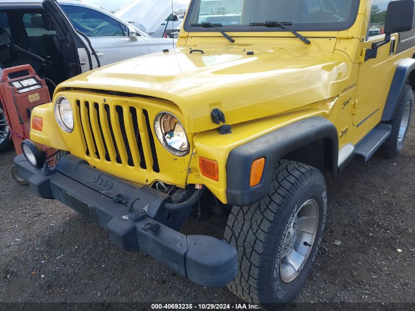 2002 Jeep Wrangler Sport VIN: 1J4FA49S62P703075 Lot: 40693235