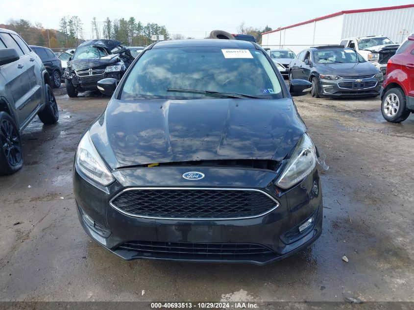 2015 Ford Focus Se VIN: 1FADP3F22FL382360 Lot: 40693513