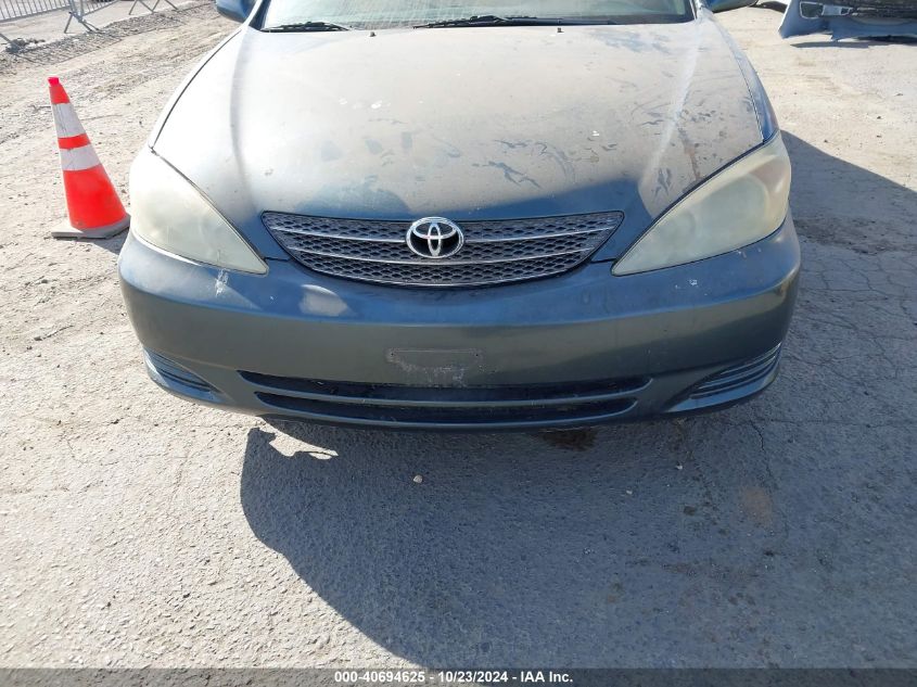 2003 Toyota Camry Le VIN: 4T1BE32K33U684125 Lot: 40694625