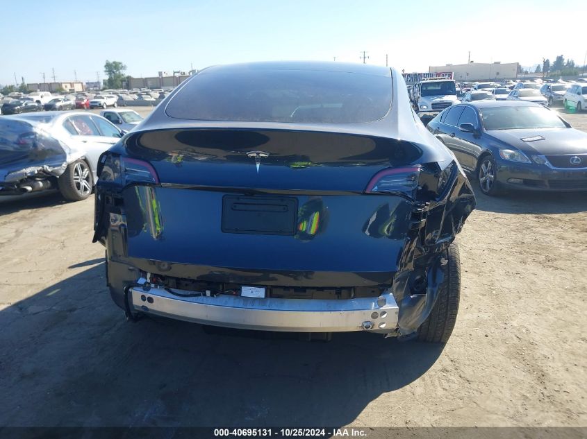 2024 Tesla Model Y Long Range Dual Motor All-Wheel Drive/Rwd VIN: 7SAYGDED9RF018063 Lot: 40695131