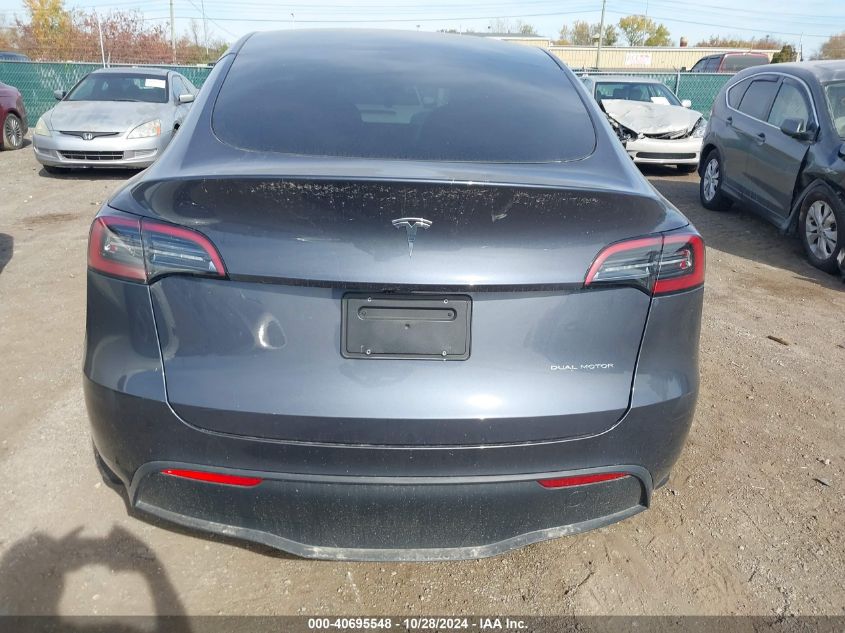 2023 Tesla Model Y VIN: 7SAYGAEEXPF695613 Lot: 40695548