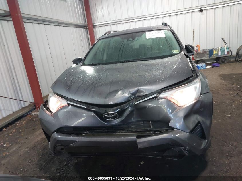 2018 Toyota Rav4 Le VIN: 2T3ZFREV8JW449860 Lot: 40695693