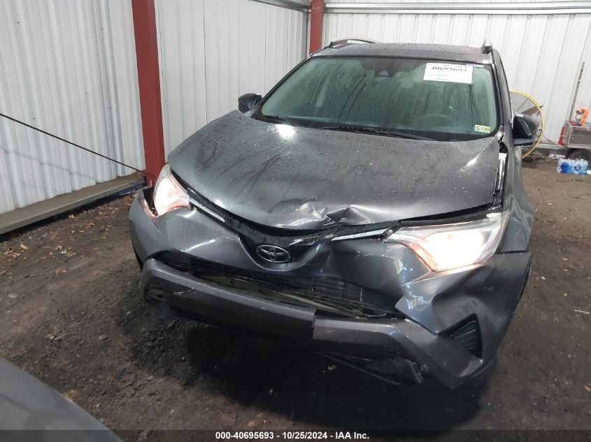 2018 Toyota Rav4 Le VIN: 2T3ZFREV8JW449860 Lot: 40695693