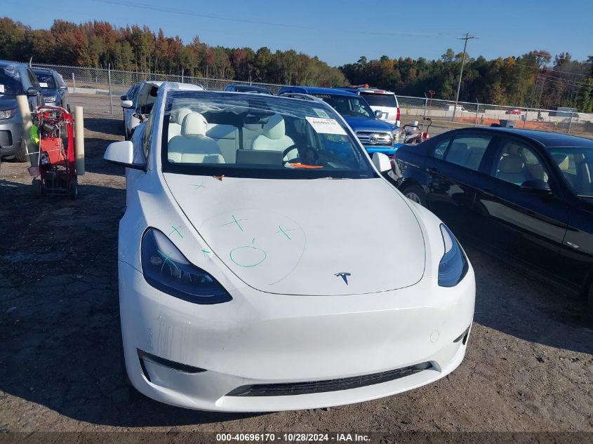 2024 Tesla Model Y Long Range Dual Motor All-Wheel Drive VIN: 7SAYGDEEXRA313534 Lot: 40696170