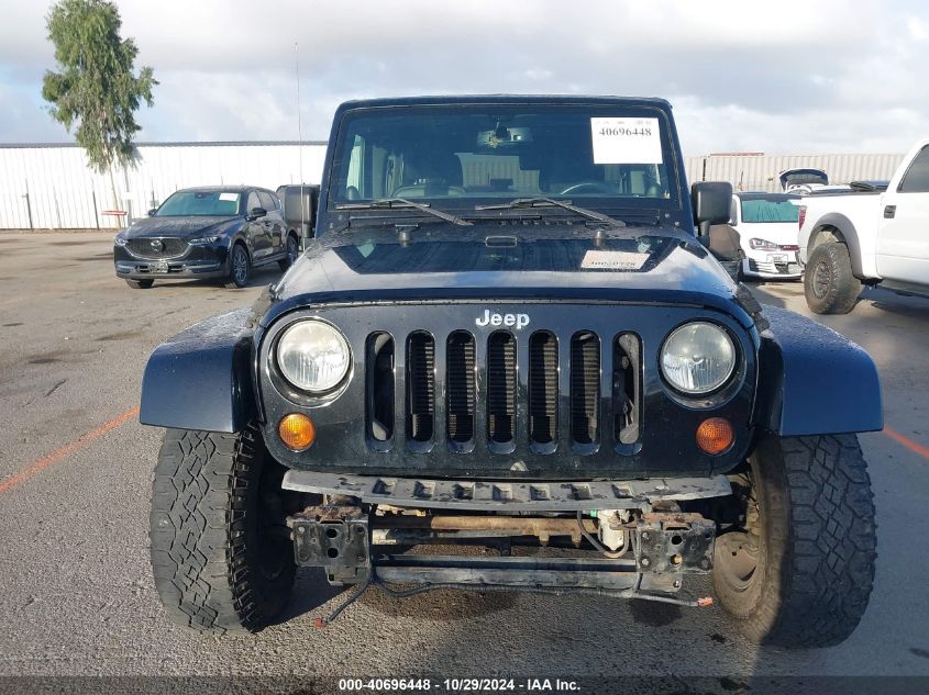 2013 Jeep Wrangler Unlimited Sahara VIN: 1C4BJWEG2DL666957 Lot: 40696448