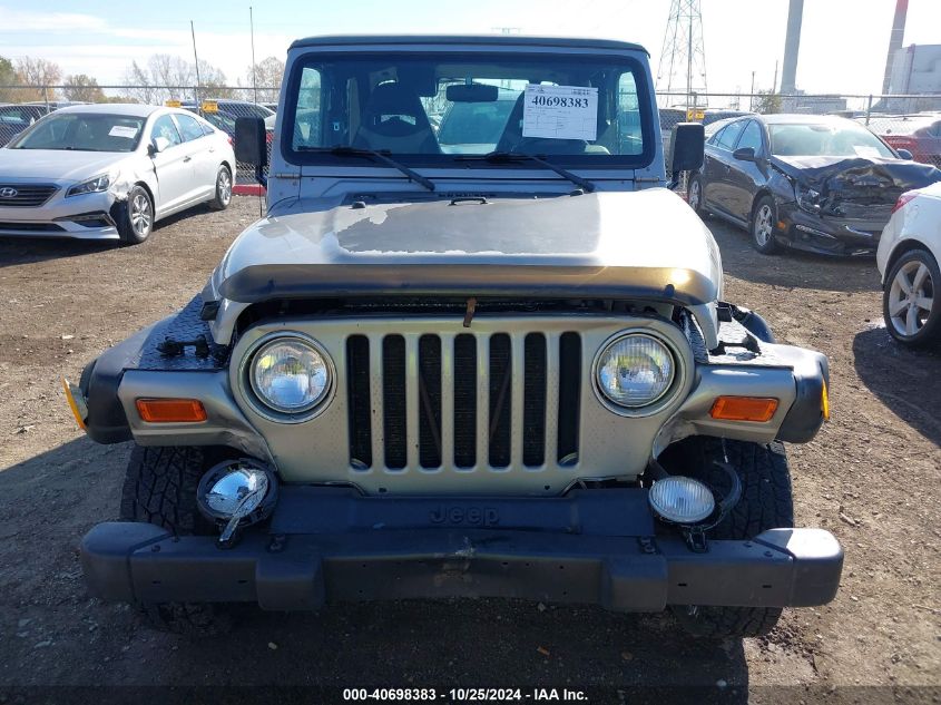 2000 Jeep Wrangler Sport VIN: 1J4FA49S2YP711859 Lot: 40698383