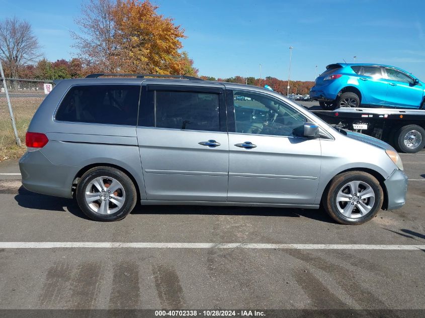 2010 Honda Odyssey Touring VIN: 5FNRL3H94AB058022 Lot: 40702338