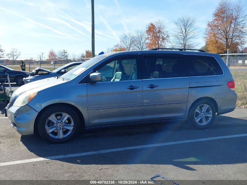 2010 Honda Odyssey Touring VIN: 5FNRL3H94AB058022 Lot: 40702338