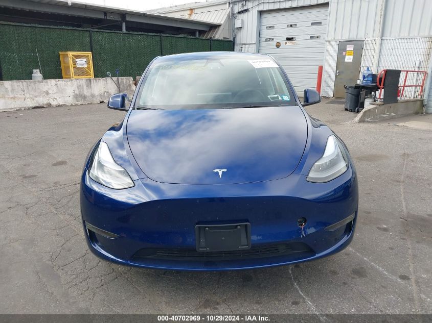 2024 Tesla Model Y Long Range Dual Motor All-Wheel Drive VIN: 7SAYGDEE9RF035101 Lot: 40702969