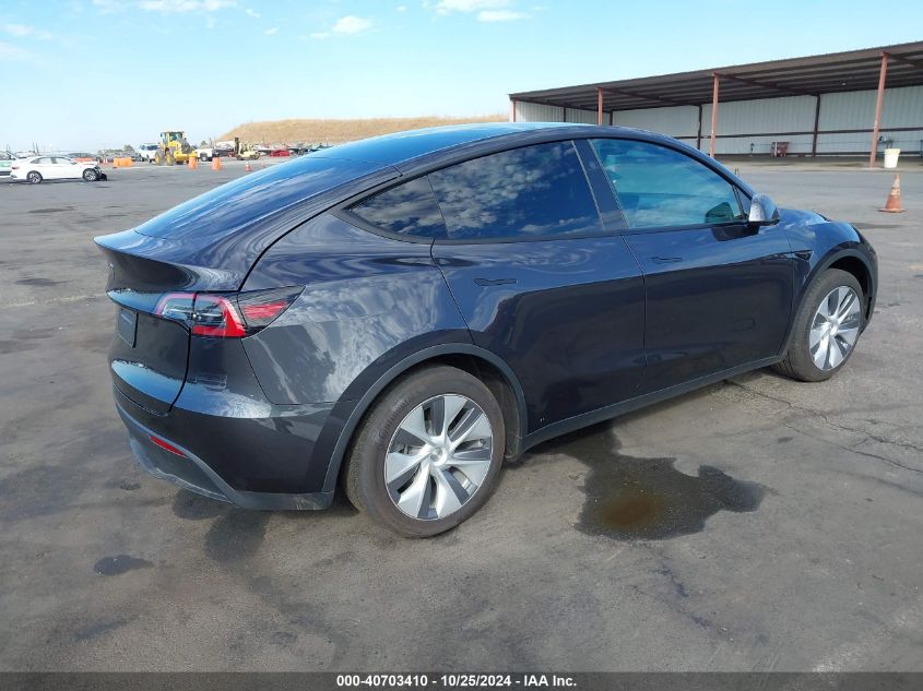 2024 Tesla Model Y Long Range Dual Motor All-Wheel Drive/Rwd VIN: 7SAYGDED8RF085723 Lot: 40703410