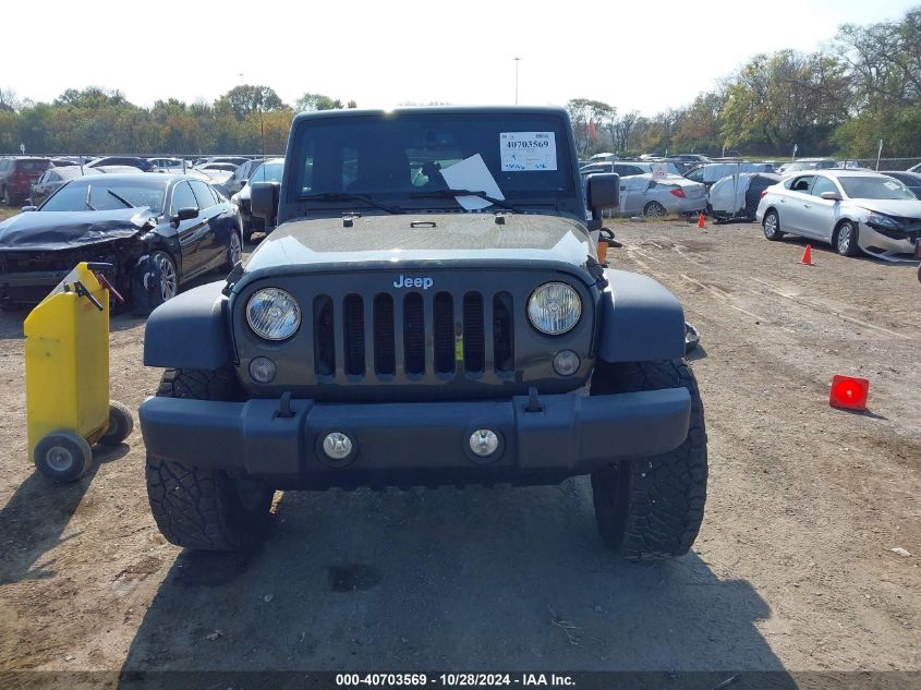 2015 Jeep Wrangler VIN: 1C4B5WDG9FL599827 Lot: 40703569