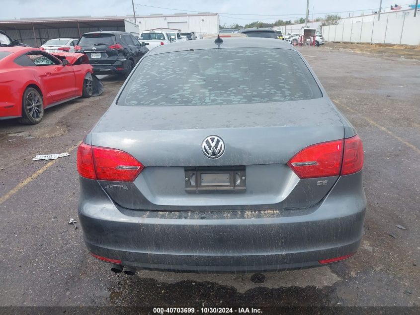 2014 Volkswagen Jetta 1.8T Se VIN: 3VWD07AJ7EM323058 Lot: 40703699