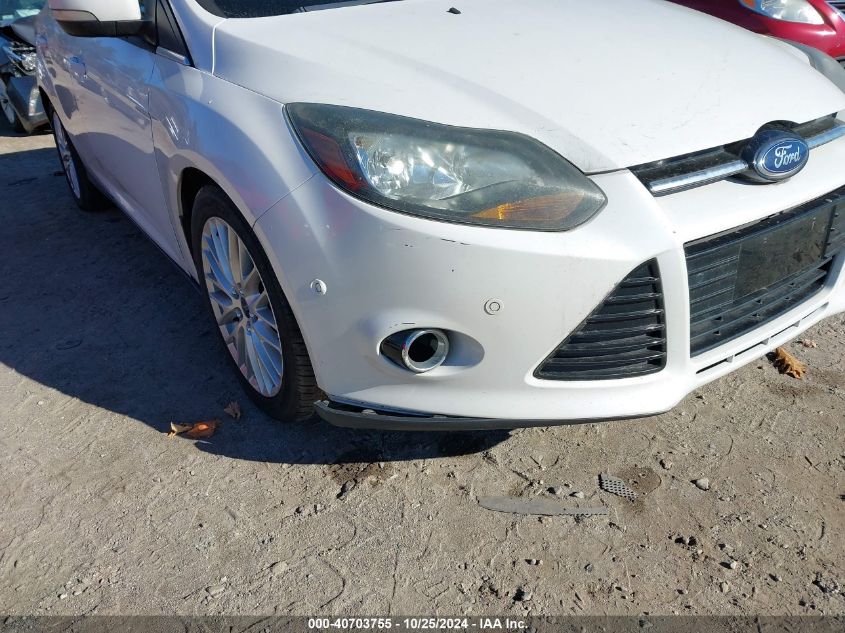 2013 Ford Focus Titanium VIN: 1FADP3N22DL349969 Lot: 40703755