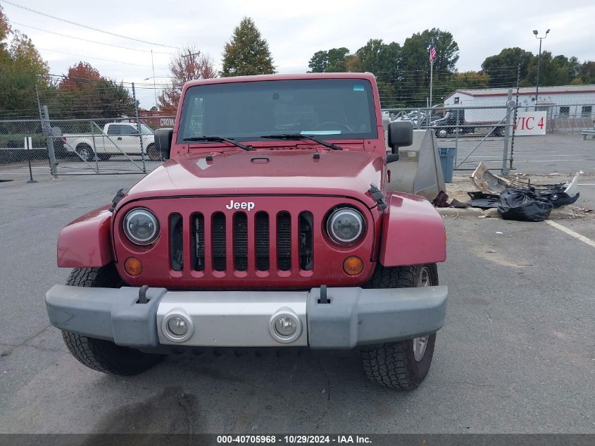 2012 Jeep Wrangler Unlimited Sahara VIN: 1C4HJWEG9CL106877 Lot: 40705968