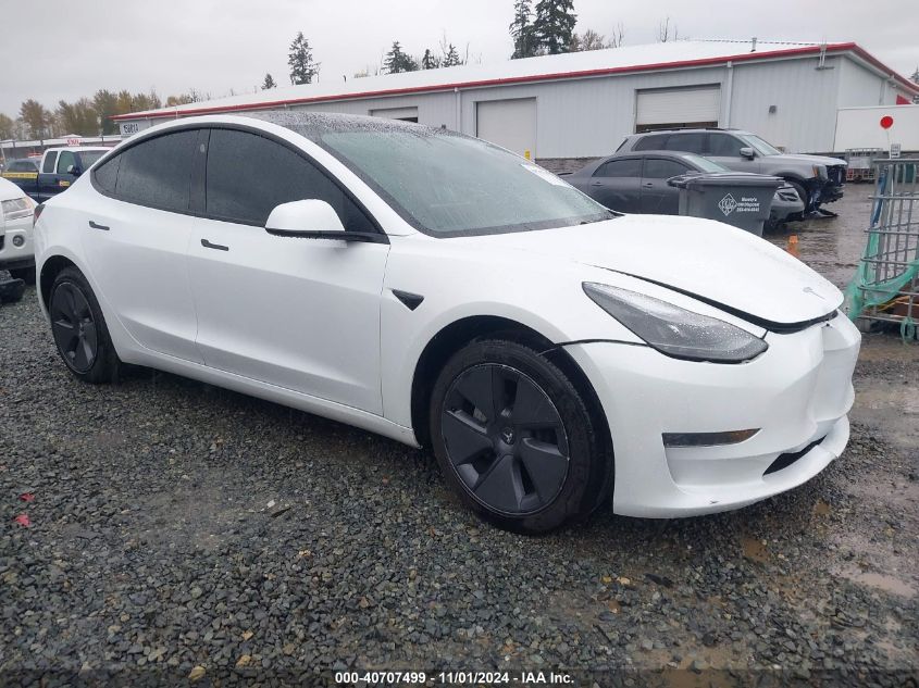 VIN 5YJ3E1EA6PF506465 2023 Tesla Model 3, Rear-Whee... no.1