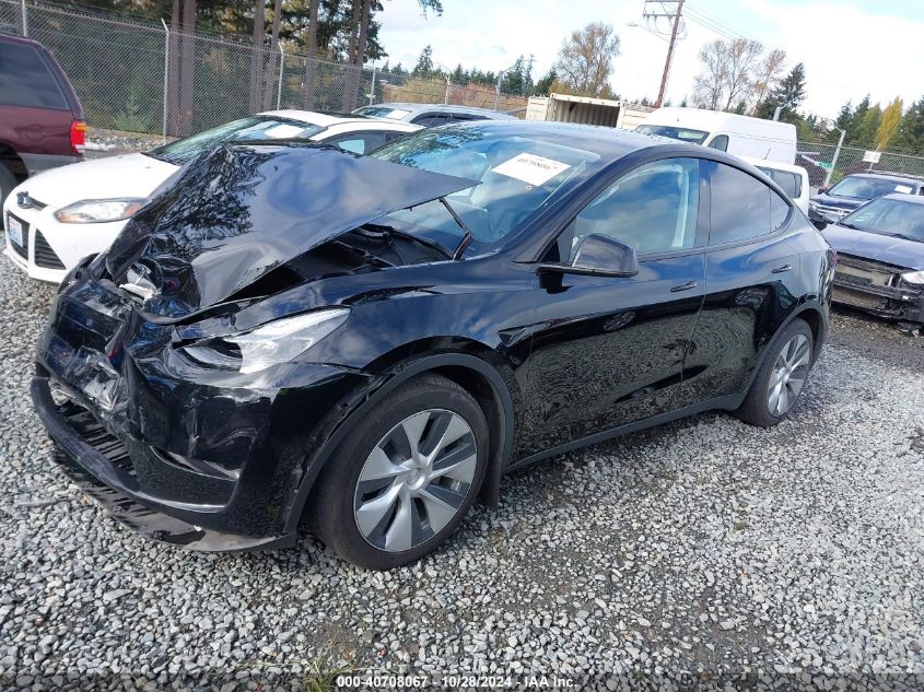 2024 Tesla Model Y Long Range Dual Motor All-Wheel Drive VIN: 7SAYGAEE8RF981351 Lot: 40708067