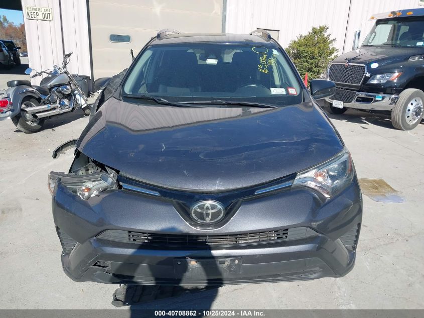 2018 Toyota Rav4 Le VIN: JTMBFREV0JJ717963 Lot: 40708862