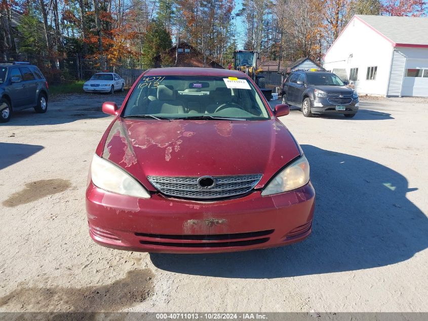 2003 Toyota Camry Le VIN: 4T1BE32K13U203692 Lot: 40711013