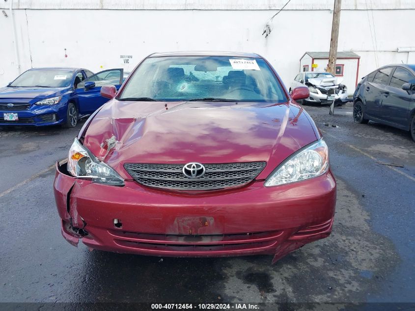 2002 Toyota Camry Le VIN: JTDBE32K420064927 Lot: 40712454